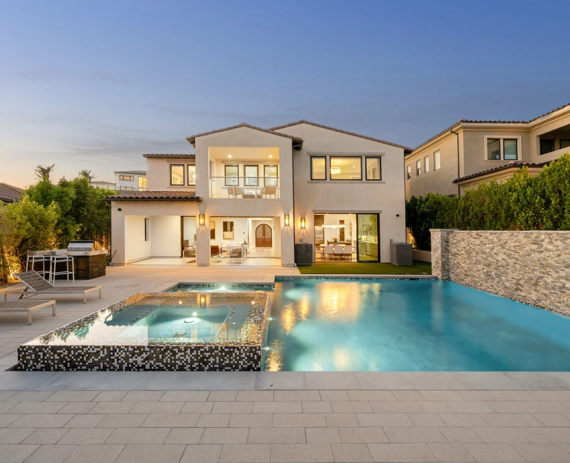 Modern house with pool and hot tub.